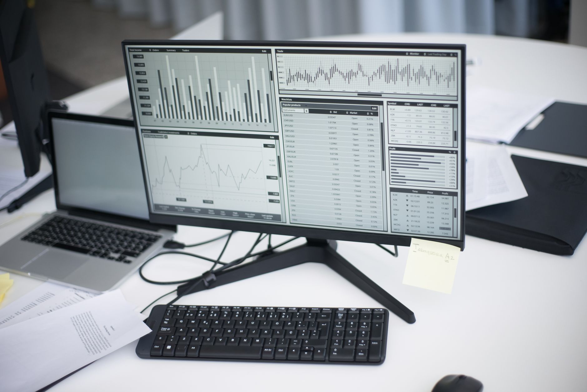 Isometric desk with a monitor showing a pie chart