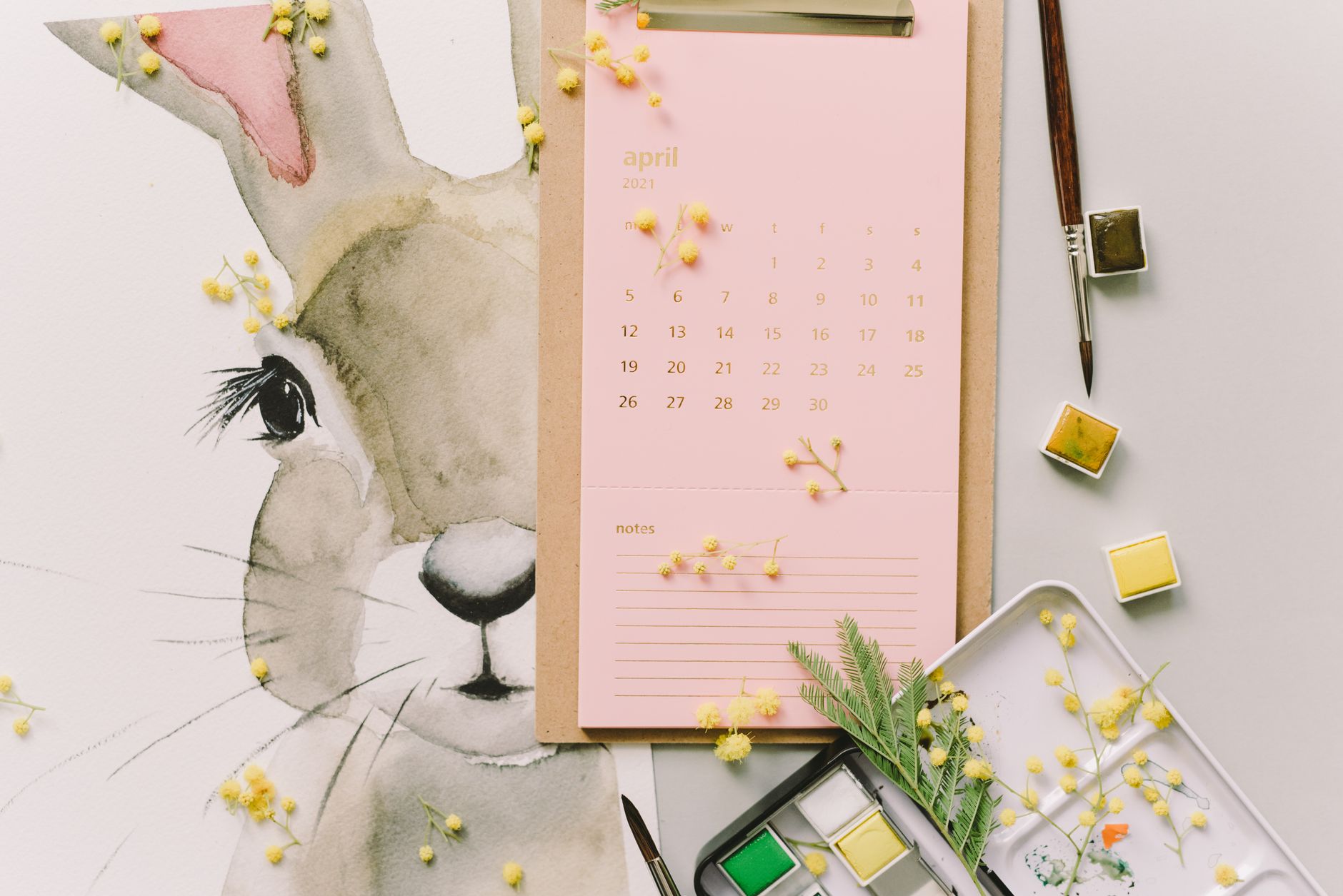 Watercolor illustration of a person weighing coins beside a calendar