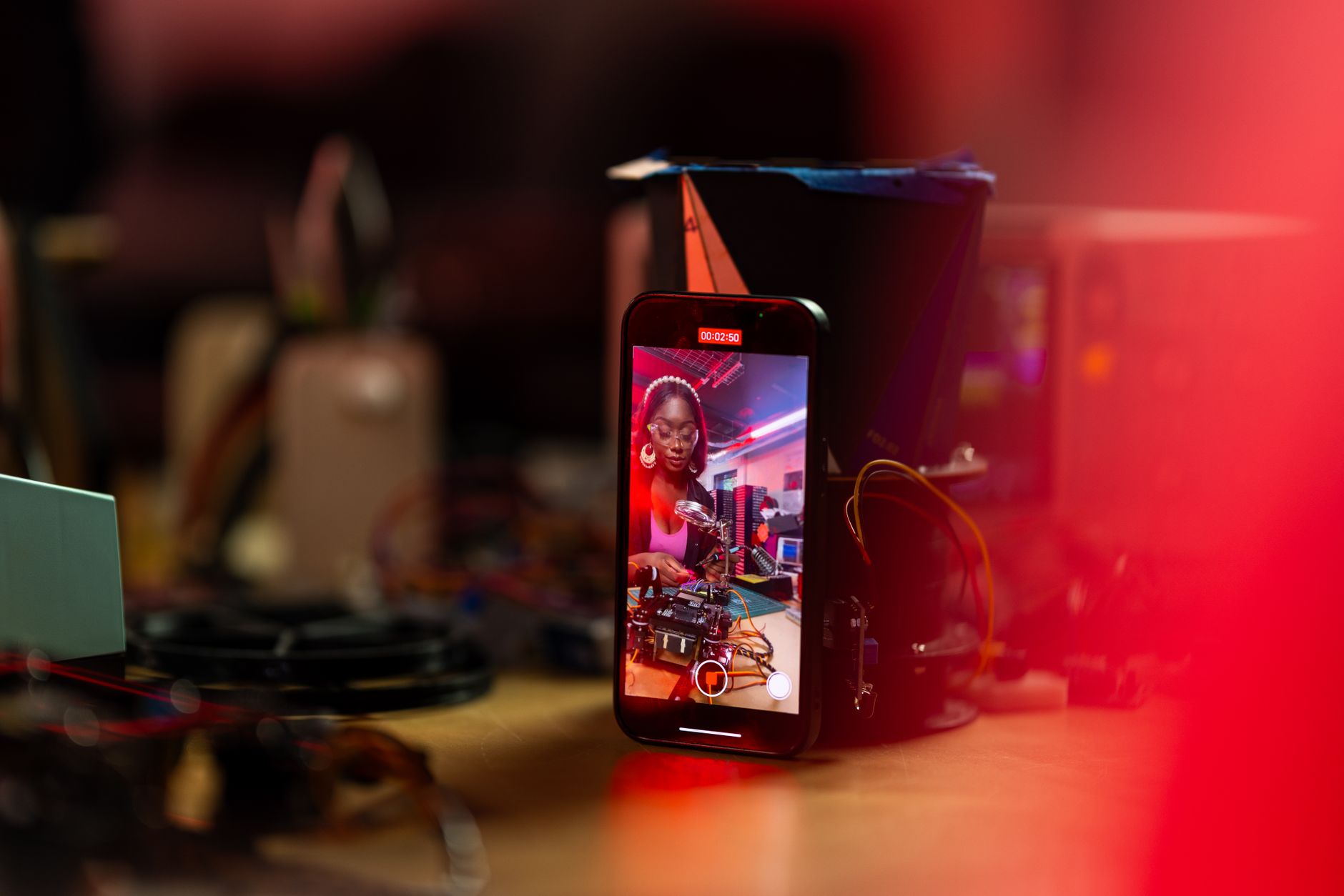 Hand scrolling a short video feed on a phone
