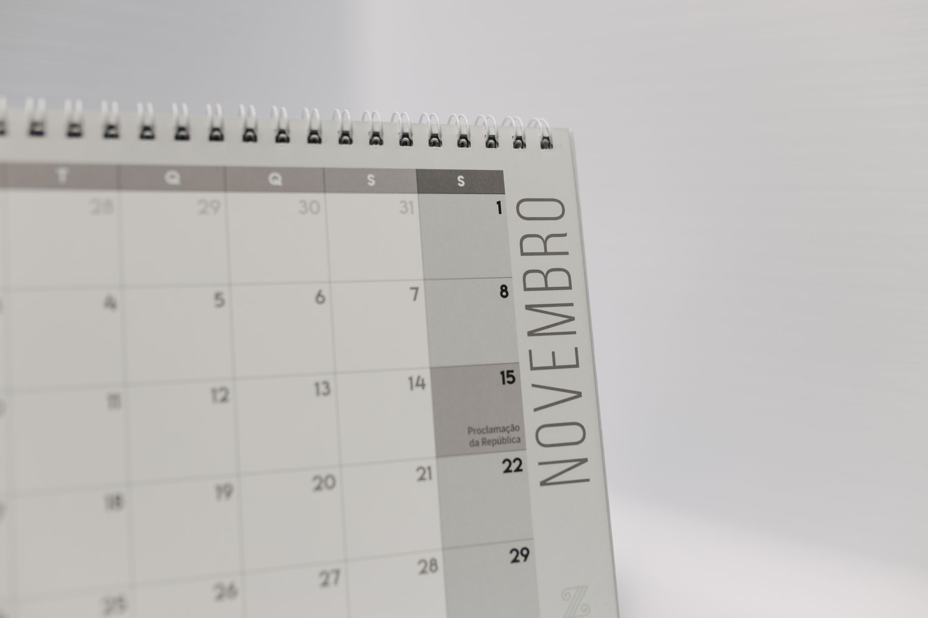 Person planning a content timeline on a wall calendar